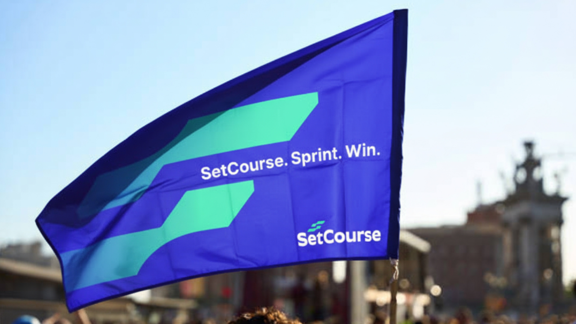 Team collaborating in front of framed sketches